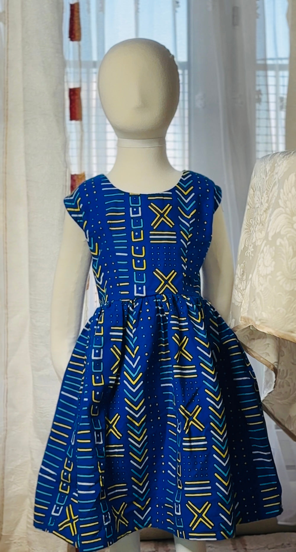 Robe pour petite fille en tissu wax Bleu en motif Bogolan